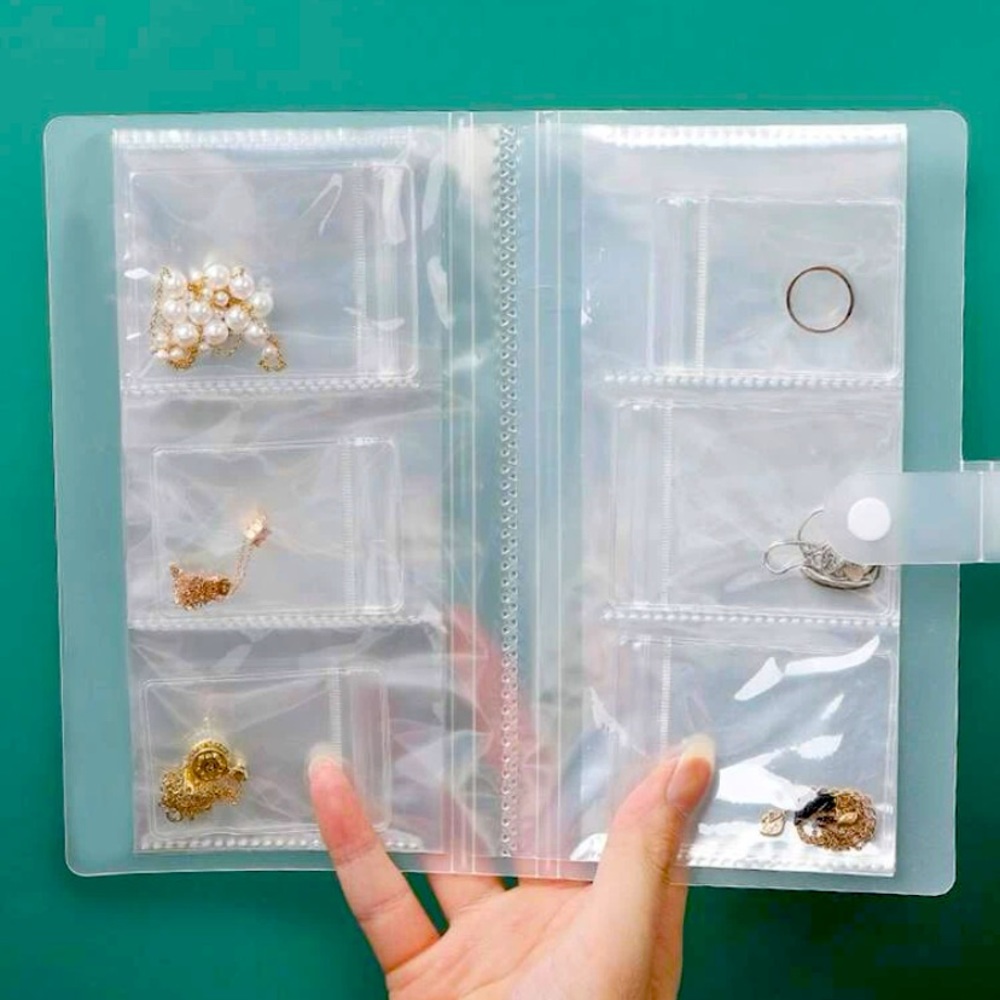Jewelry storage book with 30 small storage bags